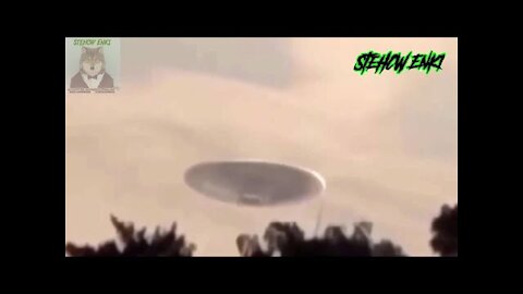 Giant saucer shaped UFO caught hovering over the train railroad