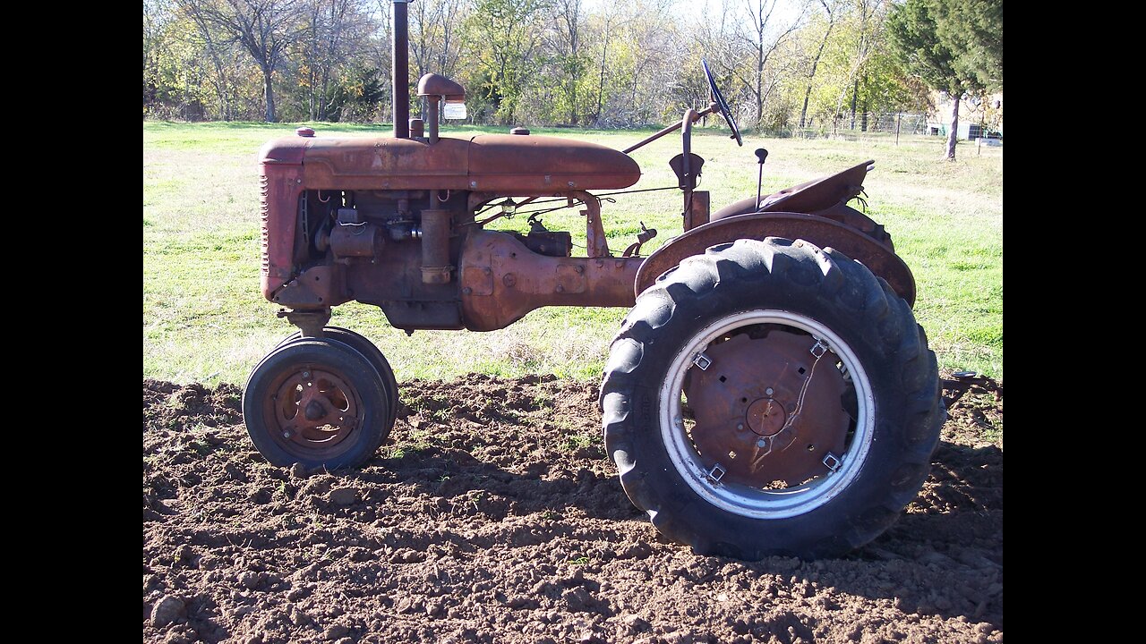 1946 Farmall B disking the family garden