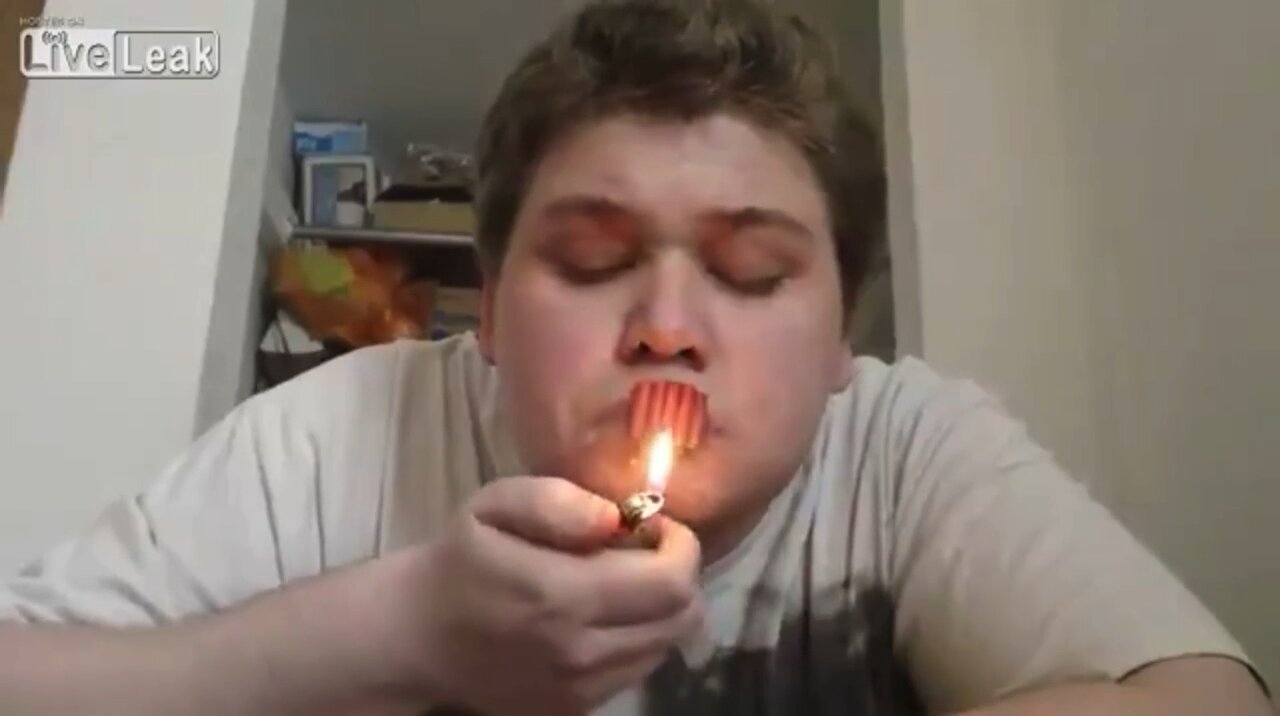 Kid Lights Firecrackers in mouth.
