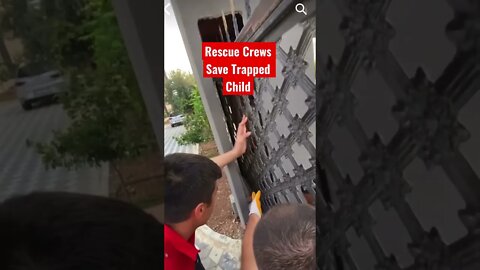 Watch: Rescue crews free a child stuck btwn a wall and electric gate #shorts