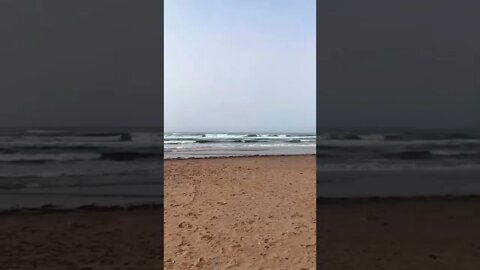 Listening to the waves on the beach