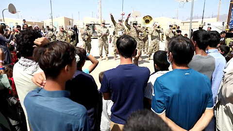 The Army's 1st Armored Division Band puts on a show for Afghan evacuees