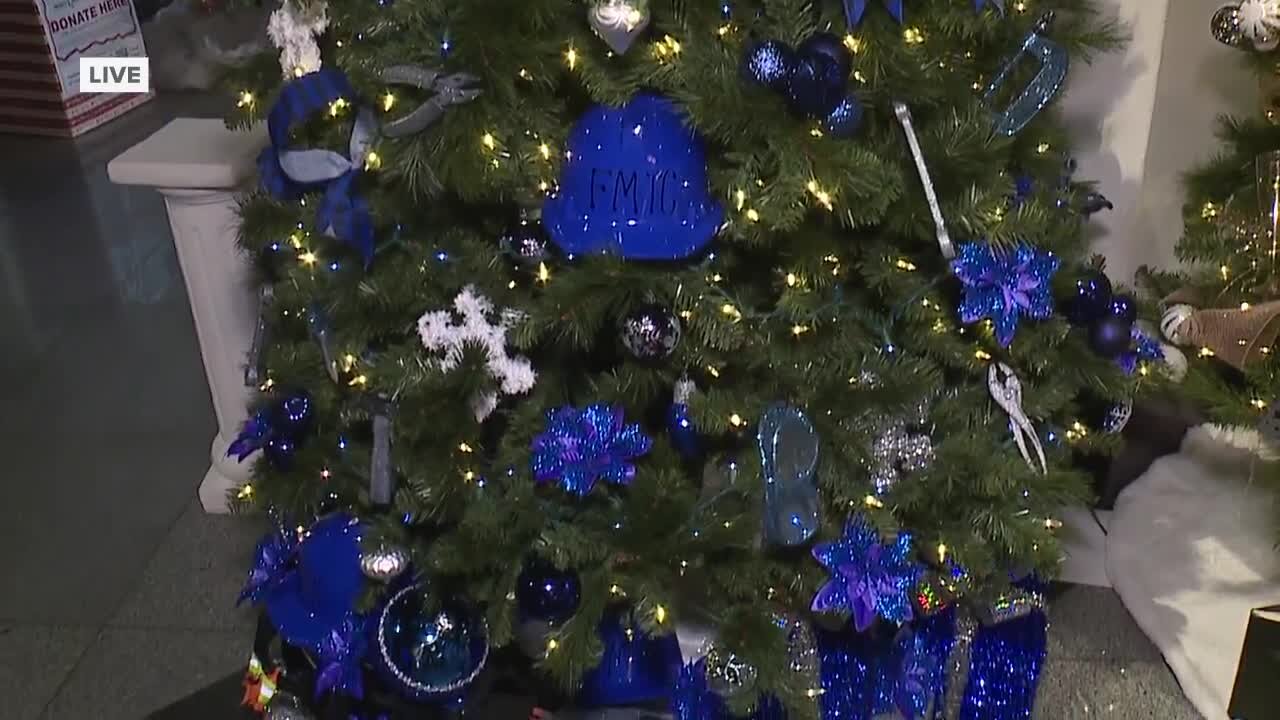 Finishing touches at Festival of Trees