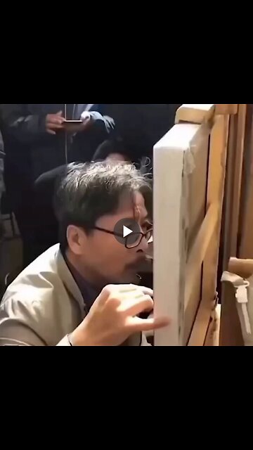 Ling Jun is a Chinese painter known for creating hyper-realistic paintings.