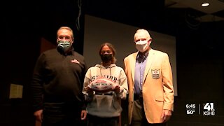 Truman varsity kicker Laney Smith surprised with DiPardo Spirit Leader award