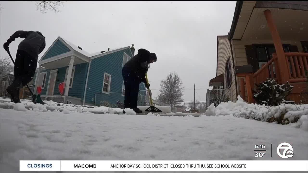 Volunteers lift spirits by helping Clawson community clear sidewalks, driveways