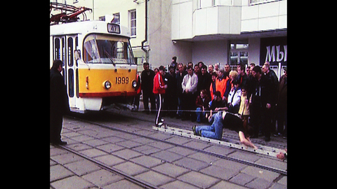 Man Pulls Tram With Hair