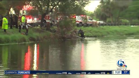 Vehicle crashes into canal at John Prince Park