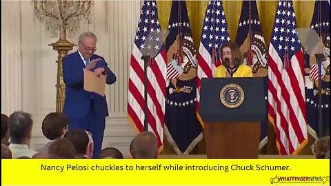 Nancy Pelosi chuckles to herself while introducing Chuck Schumer.