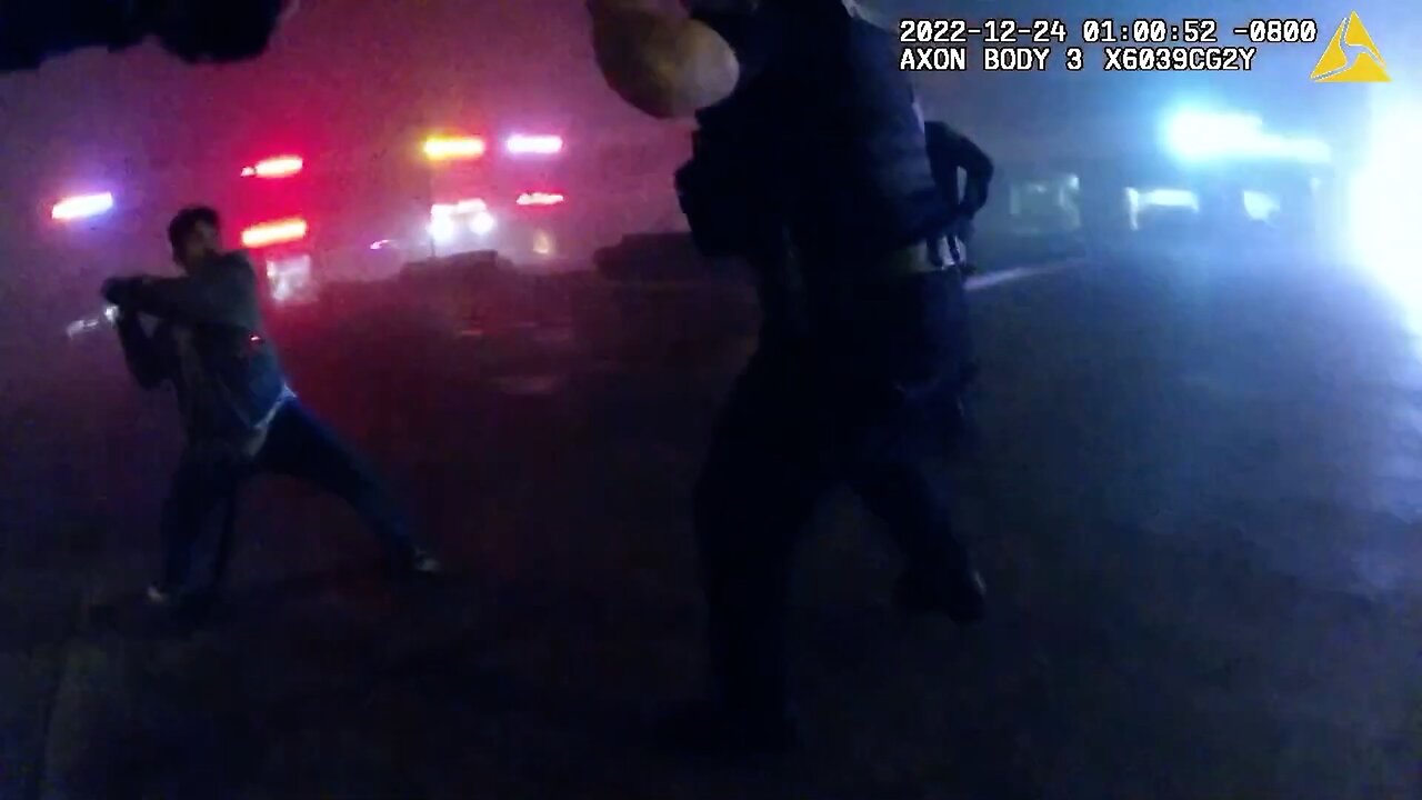 Burglary suspect shot by cops after he rushed at them with a metal pipe, bodycam shows