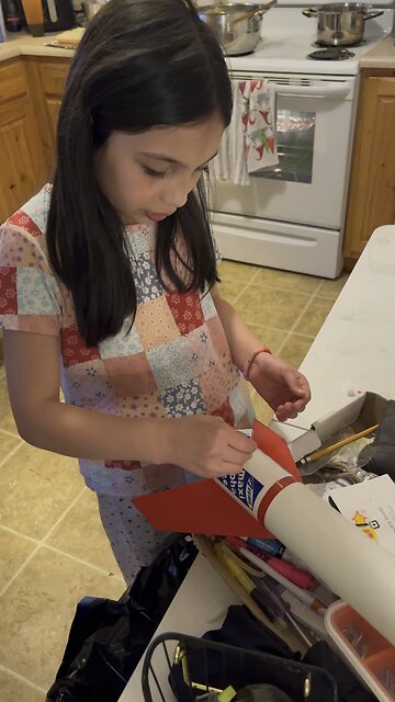 Kids repair a broken rocket wing