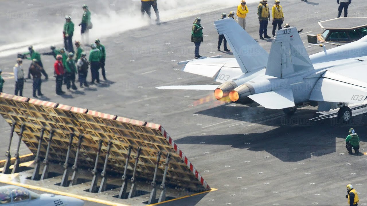 The Hypnotic Process of Launching Jets from Aircraft Carrier