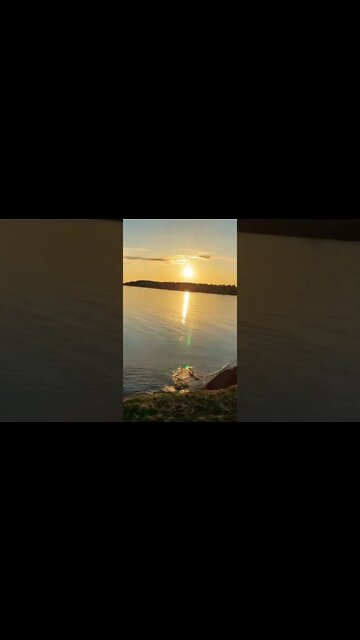 Sun set against the water