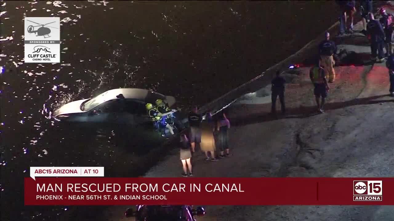 Crews rescue man from car in canal near 56th St & Indian School Rd