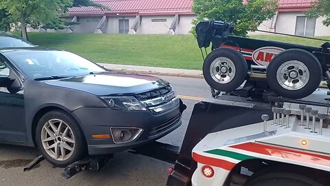 akiki Towing a car that was abandoned Middle Street