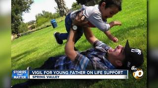 Vigil for young father on life support