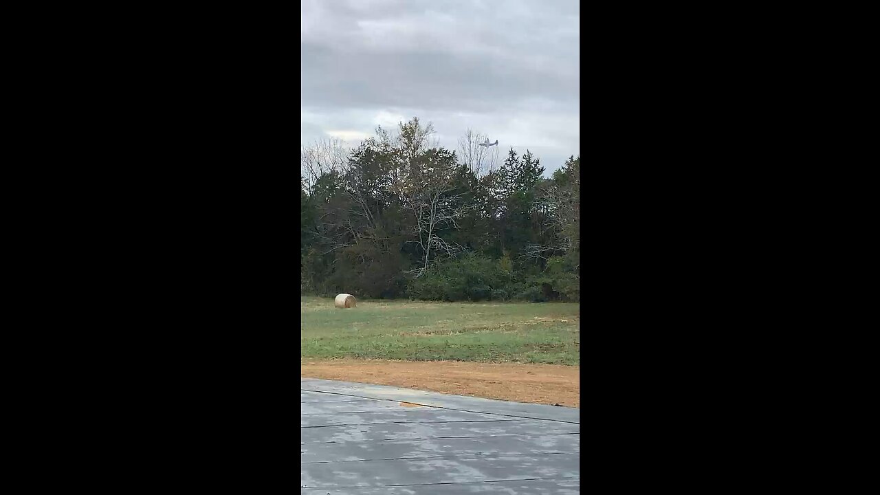 Military plane flys over house