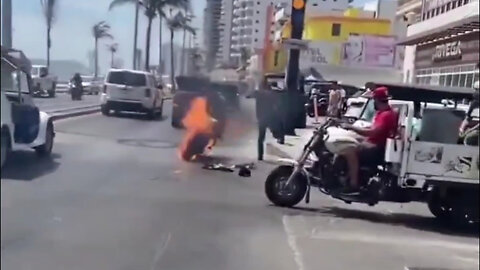 WILD! Guy's new motorcycle spontaneously combusts the first time driving it off the lot