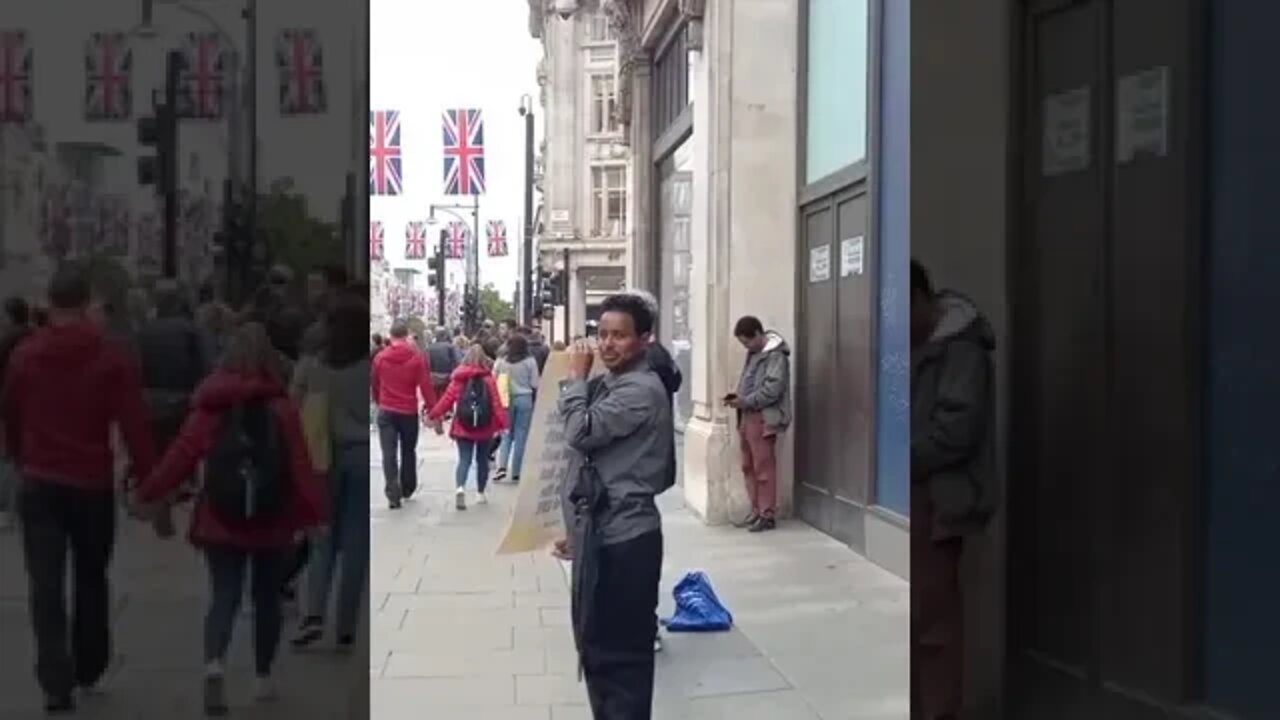 Brother Robert preaching the gospel at Oxford Circus, London.