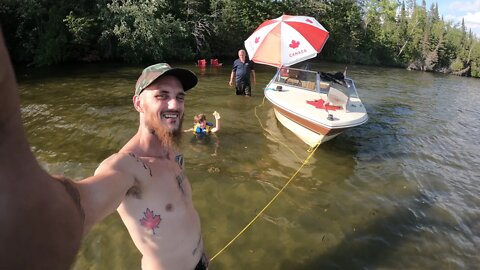 Family boating on balsam lake July