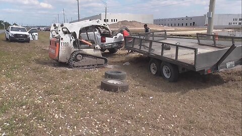 Accident Landscape Trailer comes unhitched and flipped over scattering rocks & mulch in the median