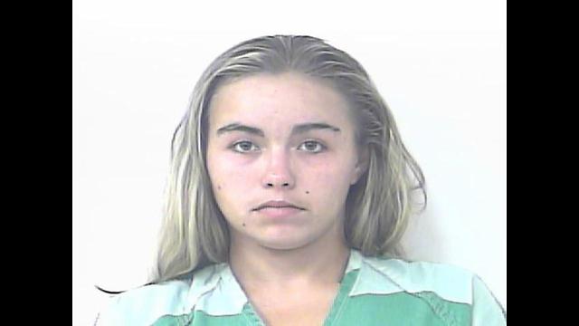 Woman charged with making 12-year-old drive