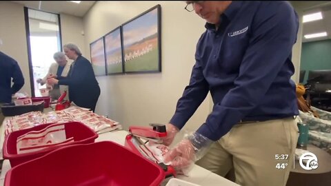 Brighton based company packs thousands of meals packets for Ukrainian refugees