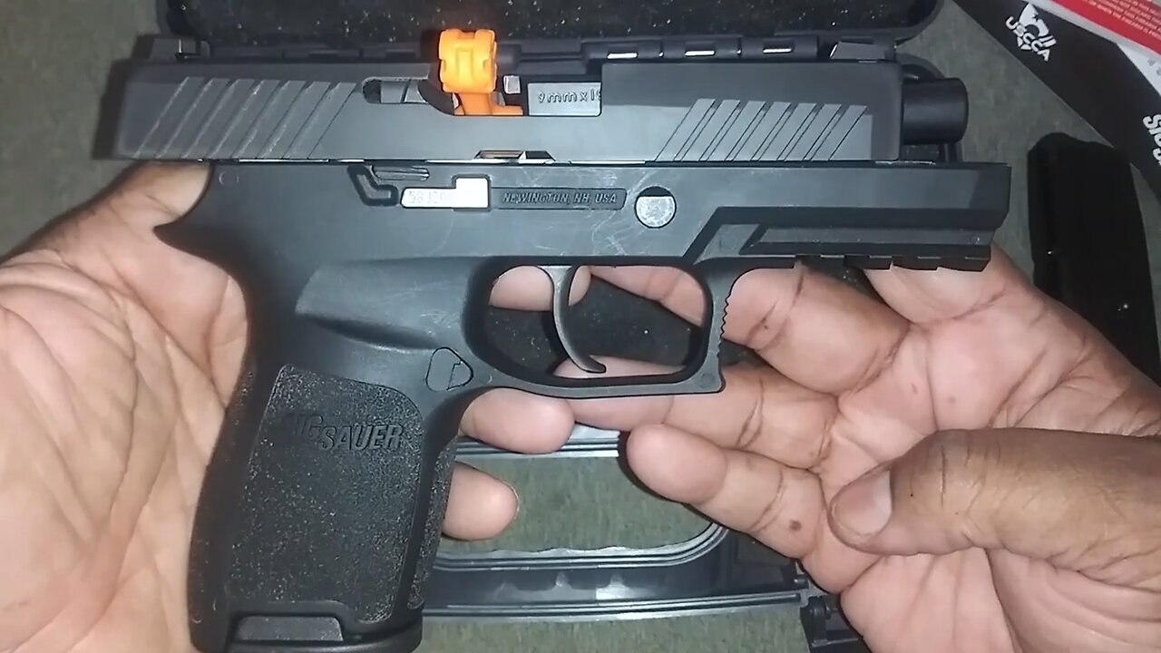 Unboxing The Sig Sauer P320 Compact 9mm Handgun.