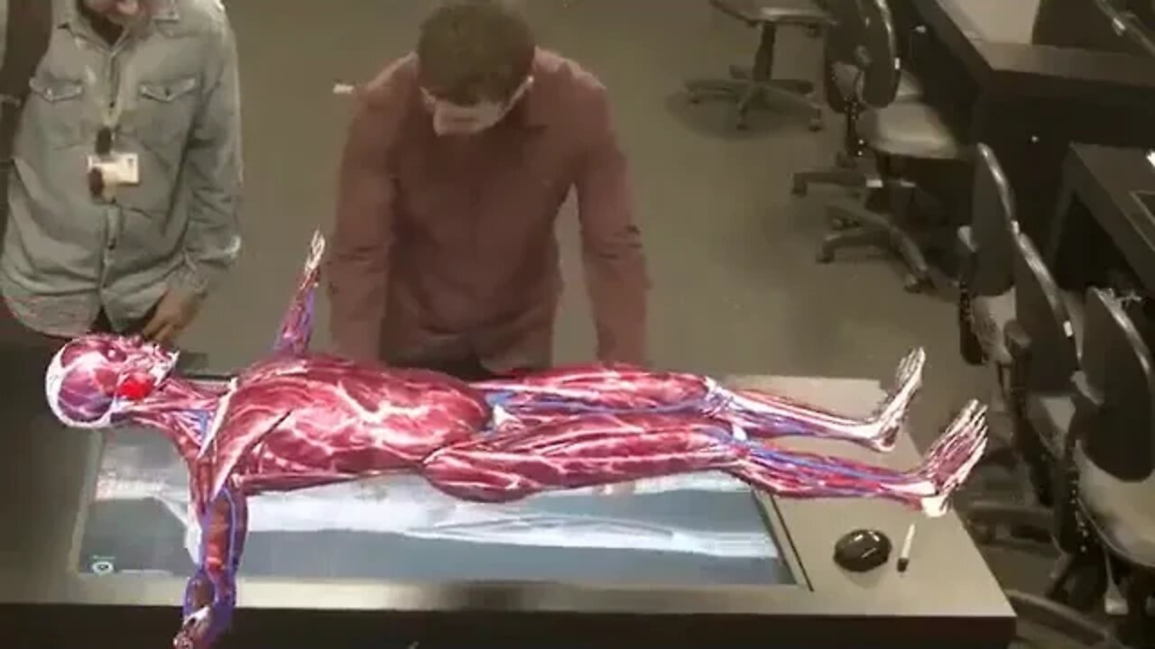 Virtual/Augmented Reality Anatomy New virtual dissection table displays the life-size i 3D image