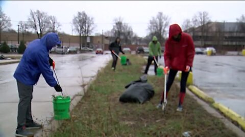 RAIN DOES NOT STOP EARTH DAY CLEANUP IN MILWAUKEE'S HARAMBEE NEIGHBORHOOD