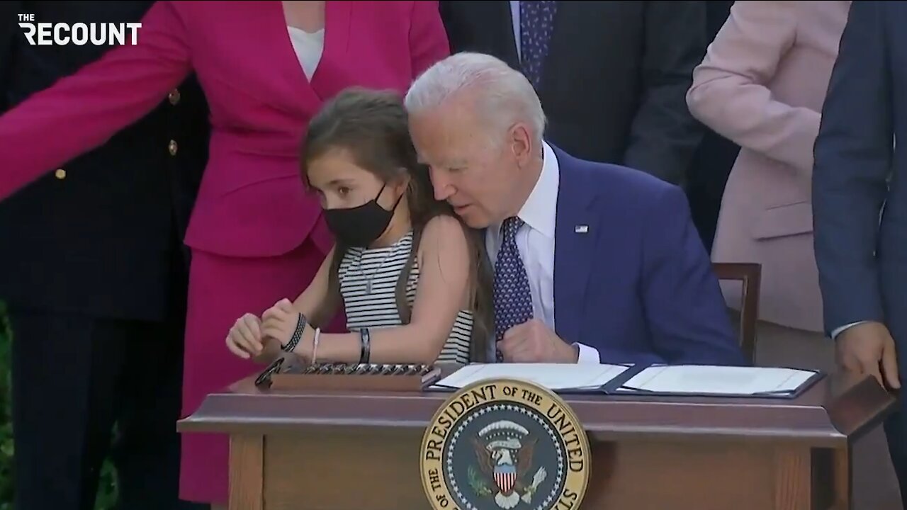 Creep Biden Takes Advantage of Photo Shoot to Breathe Down Little Girl's Neck