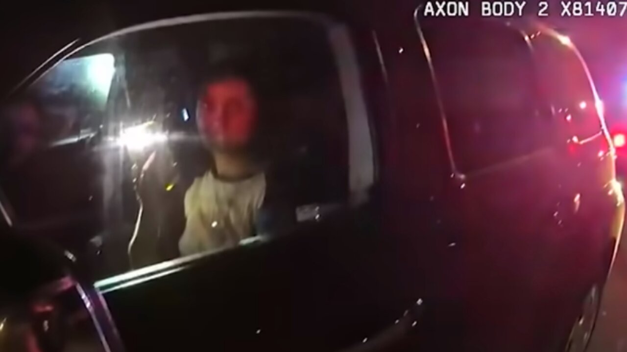 BODYCAM: Officer Breaks Woman's Window When She Tries To Ignore Him