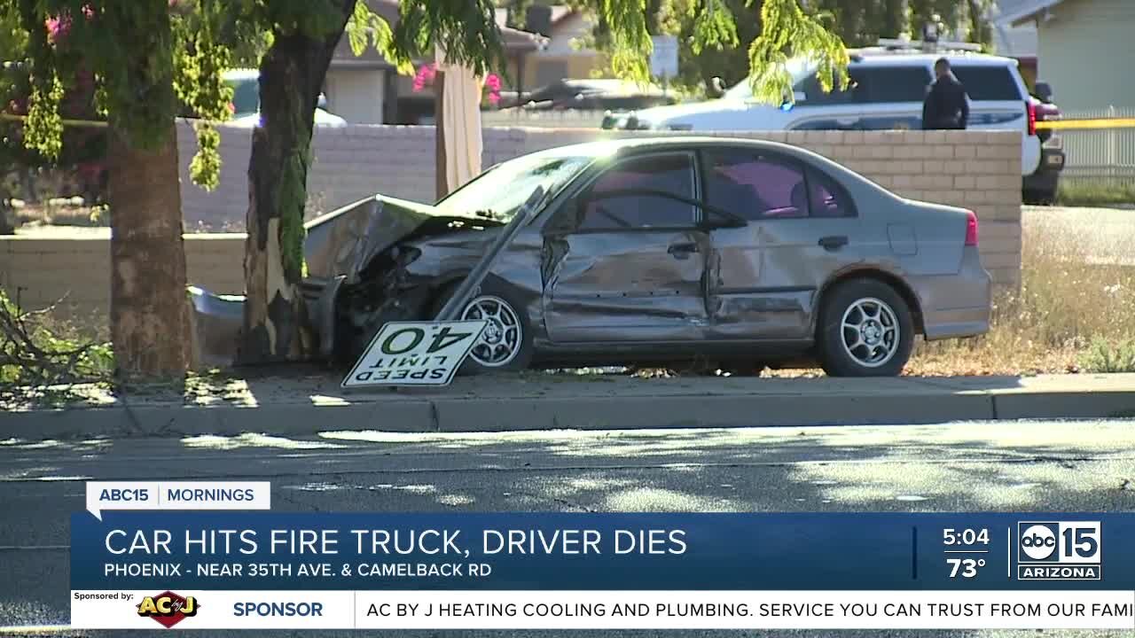 Car hits fire truck, driver dies in Phoenix