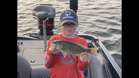 My son Theo Boat Flipping a Smallmouth Bass!