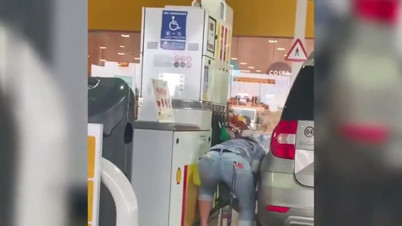 Panic Buying Woman Empties Water Bottles And Fills Them With Petrol At Pump