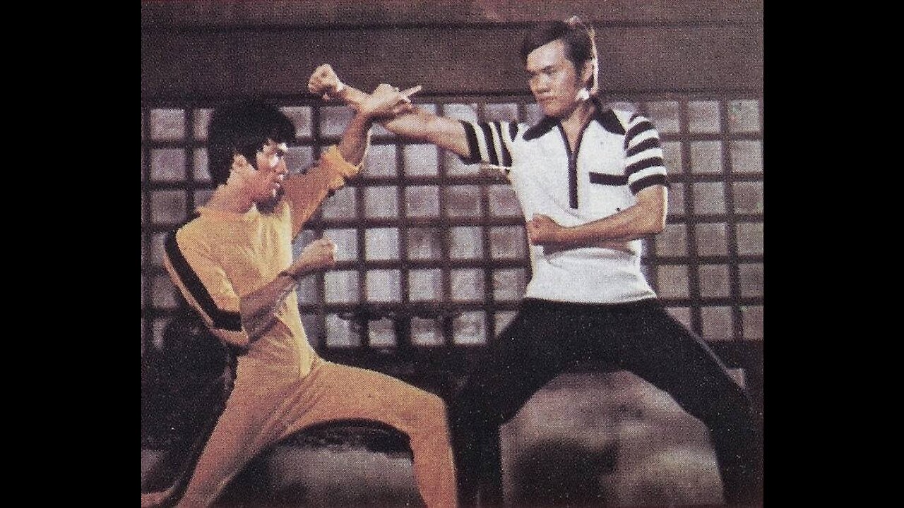 Cross kick Studio Films Bruce Lee and James Tien Game of Death