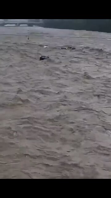 Floods near Beijing, China, destroy bridge and many cars