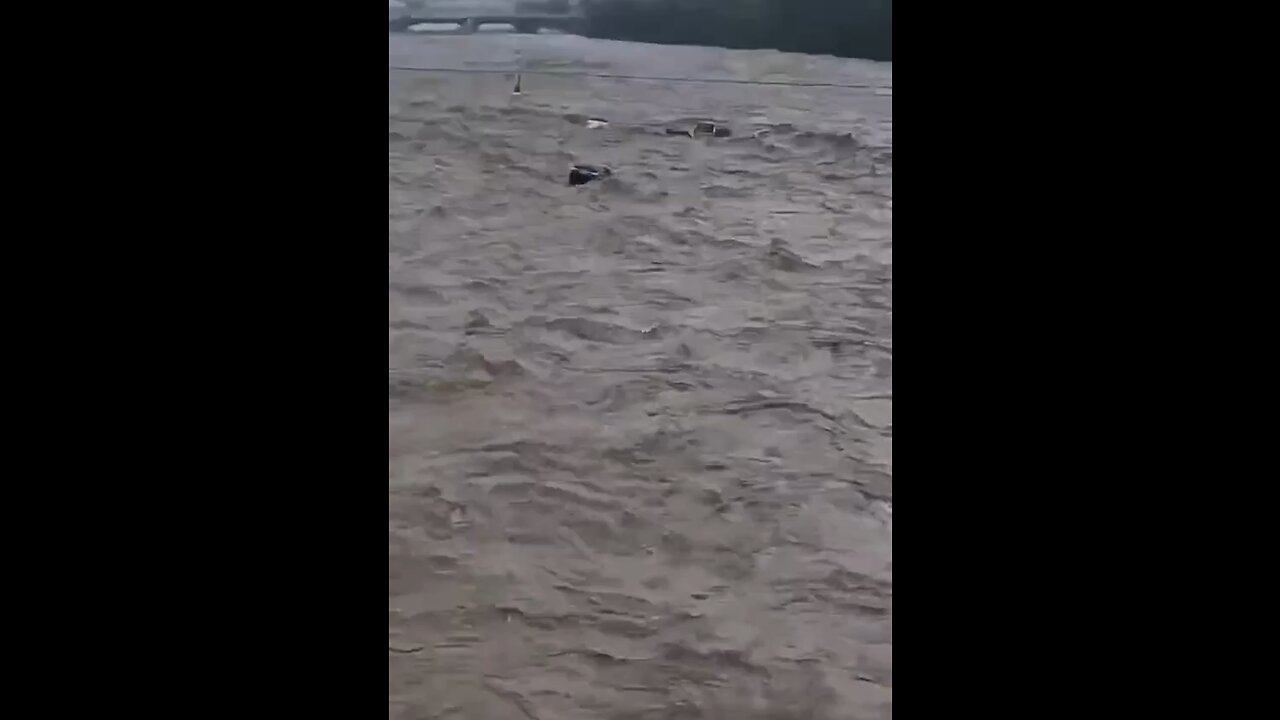 Floods near Beijing, China, destroy bridge and many cars
