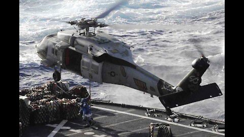 Search continues for five missing crewmembers after Navy helicopter crash; one rescued