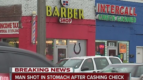 Man shot in stomach after cashing check in Indianapolis
