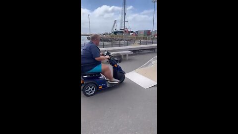 Nigel flips his mobility scooter