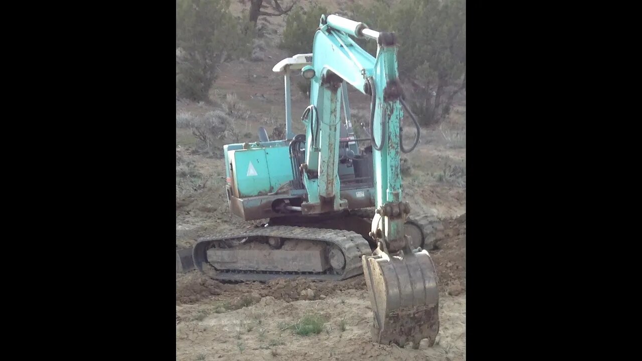 Yanmar Excavator Digging Piers In Rock