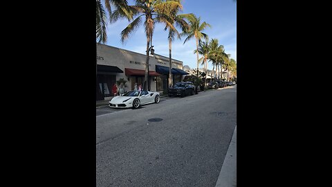 You belong to the city playing on palm beach stroll. Jayz black street