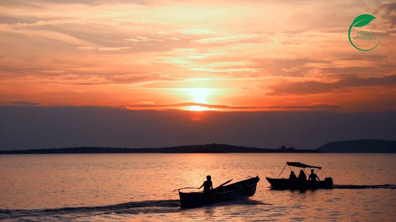 RELAXING SCENIC VIEW OF BEAUTIFUL SUNSET BY THE BEACH