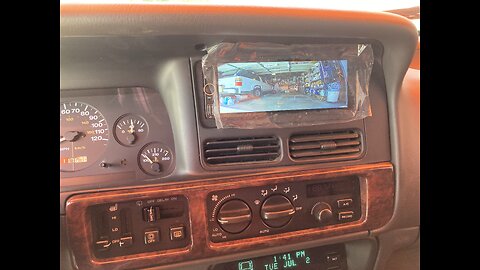 Jeep ZJ radio updated with backup camera