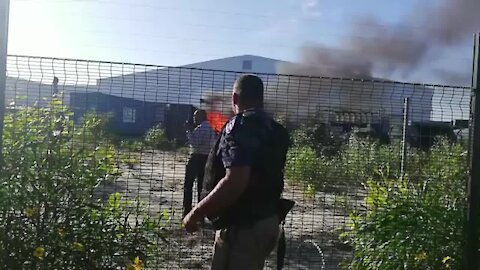 SOUTH AFRICA - Cape Town - Happy Valley protesters burning factory in Blackheath (H6H)