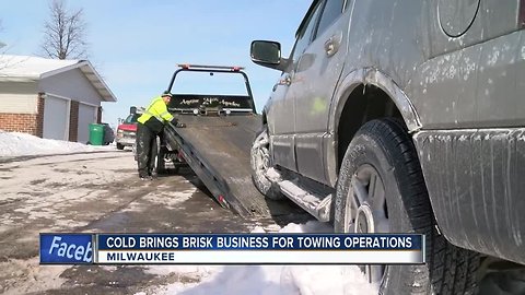 Milwaukee area tow shops busy through the bitterly cold weather