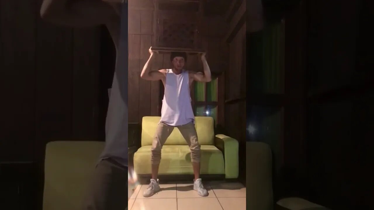 Squat exercise with furniture on head