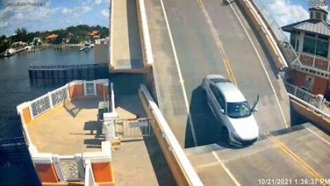 Drawbridge Opens While Car Is Still Crossing