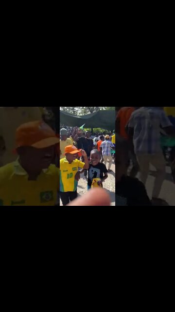 Haitianos comemorando gol do Brasil em partida contra a Suíça na Copa do Mundo do Catar